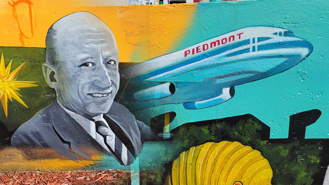 Mural painting of Tom Davis and a Piedmont Airplane